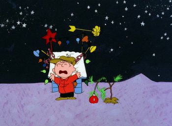 Movie still from “A Charlie Brown Christmas” (1965), directed by Bill Melendez – A charlie brown christmas scene with a charlie brown sleeping in a bed; Extreme Wide shot, Low angle