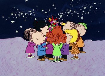 Movie still from “A Charlie Brown Christmas” (1965), directed by Bill Melendez – A group of children gathered around a christmas tree; Extreme Wide shot, Overhead angle
