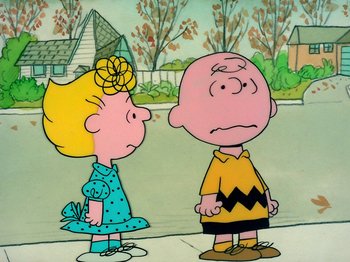 Movie still from “A Charlie Brown Thanksgiving” (1973), directed by Phil Roman – A charlie brown and a girl in a blue dress; Medium shot, High angle