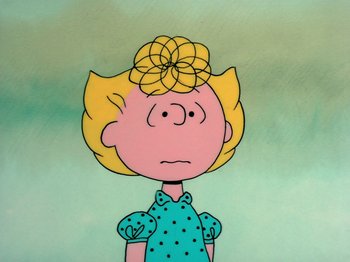 Movie still from “A Charlie Brown Thanksgiving” (1973), directed by Phil Roman – A drawing of a girl with blonde hair and polka dot dress; Close Up shot, High angle