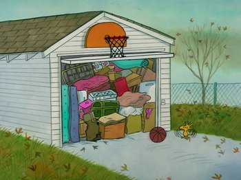 Movie still from “A Charlie Brown Thanksgiving” (1973), directed by Phil Roman – An illustration of a garage filled with lots of clutter; Extreme Wide shot, High angle