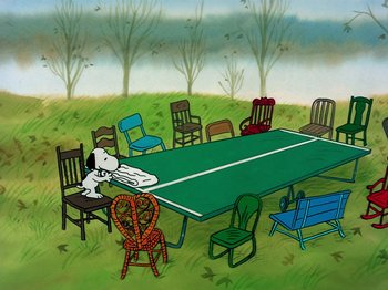 Movie still from “A Charlie Brown Thanksgiving” (1973), directed by Phil Roman – An animated scene of a table tennis table with chairs around it; Extreme Wide shot, High angle