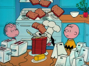 Movie still from “A Charlie Brown Thanksgiving” (1973), directed by Phil Roman – Charlie brown and snoopy in front of a stove and oven; Extreme Wide shot, Overhead angle