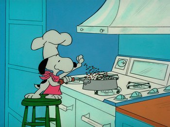 Movie still from “A Charlie Brown Thanksgiving” (1973), directed by Phil Roman – A dog in a chef's hat is stirring a pot; Medium shot, Low angle