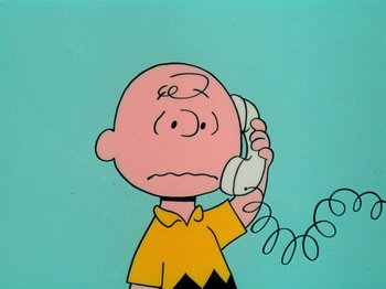 Movie still from “A Charlie Brown Thanksgiving” (1973), directed by Phil Roman – Charlie brown talking on the phone in front of a blue background; Close Up shot, High angle