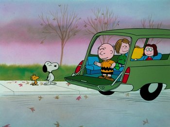 Movie still from “A Charlie Brown Thanksgiving” (1973), directed by Phil Roman – A scene from a peanuts cartoon with charlie brown , snoopy , and the peanuts gang; Extreme Wide shot, High angle