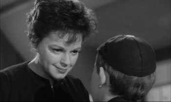 Movie still from “A Child Is Waiting” (1963), directed by John Cassavetes – An older woman talking to a young boy; Close Up shot, Over the shoulder angle