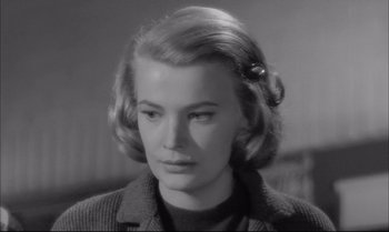 Movie still from “A Child Is Waiting” (1963), directed by John Cassavetes – A black and white photo of a woman in a sweater; Close Up shot, Low angle