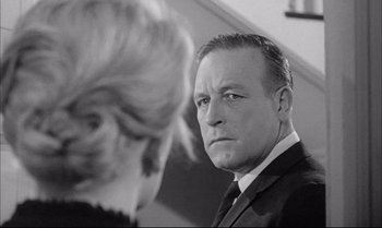 Movie still from “A Child Is Waiting” (1963), directed by John Cassavetes – A black and white photo of a man and a woman; Close Up shot, Over the shoulder angle