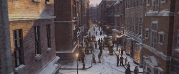 Movie still from “A Christmas Carol” (2009), directed by Robert Zemeckis – People walking down a street in the snow; Extreme Wide shot, High angle