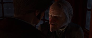 Movie still from “A Christmas Carol” (2009), directed by Robert Zemeckis – An old man and a young man talking to each other; Close Up shot, Over the shoulder angle