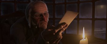 Movie still from “A Christmas Carol” (2009), directed by Robert Zemeckis – An old man looking at a piece of paper; Close Up shot, Over the shoulder angle