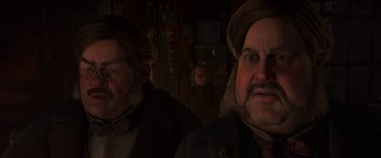 Movie still from “A Christmas Carol” (2009), directed by Robert Zemeckis – A man with a beard and a mustache is standing next to another man with a beard and a mustache; Close Up shot, Over the shoulder angle