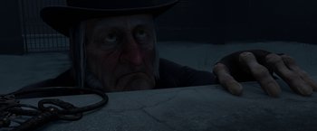 Movie still from “A Christmas Carol” (2009), directed by Robert Zemeckis – An old man wearing a hat looking over a ledge; Close Up shot, High angle