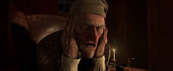 Movie still from “A Christmas Carol” (2009), directed by Robert Zemeckis – An old man with his hands over his ears; Close Up shot, Low angle