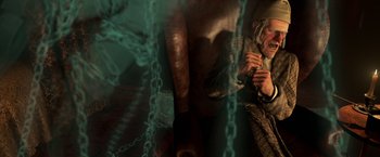 Movie still from “A Christmas Carol” (2009), directed by Robert Zemeckis – A woman sitting on a chair next to a horse; Medium shot, Low angle