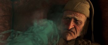 Movie still from “A Christmas Carol” (2009), directed by Robert Zemeckis – An old man wearing a hat is looking at the camera; Close Up shot, Low angle