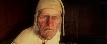 Movie still from “A Christmas Carol” (2009), directed by Robert Zemeckis – An old man wearing a white hat and a white shirt; Close Up shot, Low angle