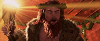 Movie still from “A Christmas Carol” (2009), directed by Robert Zemeckis – A man with long hair and a beard wearing a crown; Close Up shot, Low angle