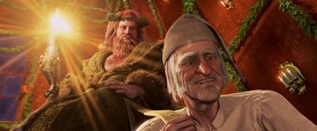 Movie still from “A Christmas Carol” (2009), directed by Robert Zemeckis – An old man with a beard is holding a book; Close Up shot, Over the shoulder angle