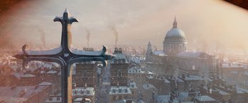 Movie still from “A Christmas Carol” (2009), directed by Robert Zemeckis – An aerial view of a city with snow on the ground; Extreme Wide shot, High angle
