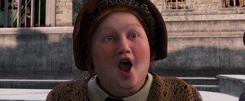 Movie still from “A Christmas Carol” (2009), directed by Robert Zemeckis – A woman with blue eyes wearing a brown hat; Close Up shot, High angle