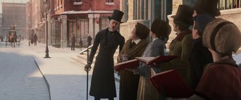Movie still from “A Christmas Carol” (2009), directed by Robert Zemeckis – Two women and a man dressed as dickens characters; Medium shot, Over the shoulder angle