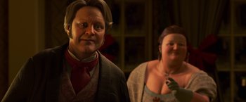 Movie still from “A Christmas Carol” (2009), directed by Robert Zemeckis – A man and a woman standing next to each other; Close Up shot, Over the shoulder angle