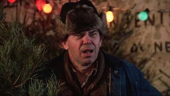 Movie still from “A Christmas Story” (1983), directed by Bob Clark – A person wearing a fur hat; Close Up shot, Low angle