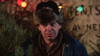 Movie still from “A Christmas Story” (1983), directed by Bob Clark – A person wearing a fur hat; Close Up shot, Low angle
