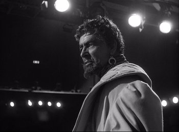 Movie still from “A Double Life” (1947), directed by George Cukor – Black and white photograph of a bearded man wearing a robe; Close Up shot, Low angle