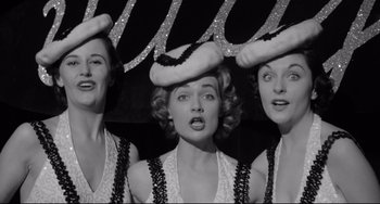 Movie still from “A Face in the Crowd” (1957), directed by Elia Kazan – A group of women standing next to each other; Close Up shot, Low angle