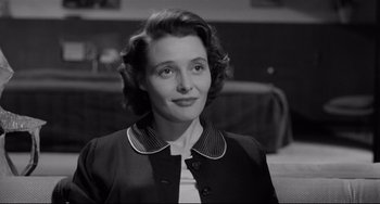 Movie still from “A Face in the Crowd” (1957), directed by Elia Kazan – An old photo of a woman in a black and white photo; Close Up shot, Low angle