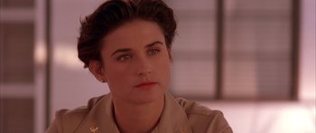 Movie still from “A Few Good Men” (1992), directed by Rob Reiner – A person wearing a uniform; Close Up shot, Over the shoulder angle