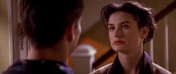 Movie still from “A Few Good Men” (1992), directed by Rob Reiner – A man and a woman looking at one another; Close Up shot, Over the shoulder angle