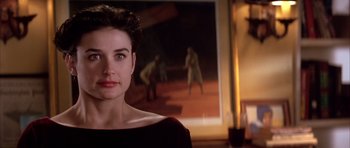 Movie still from “A Few Good Men” (1992), directed by Rob Reiner – A person in front of a painting; Close Up shot, Over the shoulder angle