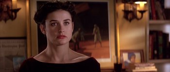 Movie still from “A Few Good Men” (1992), directed by Rob Reiner – A woman standing in front of a painting; Close Up shot, Over the shoulder angle
