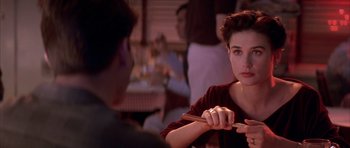 Movie still from “A Few Good Men” (1992), directed by Rob Reiner – A woman holding chopsticks in her hands; Close Up shot, Over the shoulder angle