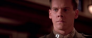 Movie still from “A Few Good Men” (1992), directed by Rob Reiner – A person wearing a uniform; Close Up shot, Low angle
