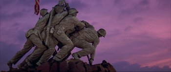 Movie still from “A Few Good Men” (1992), directed by Rob Reiner – A group of soldiers climbing up a hill; Wide shot, Low angle