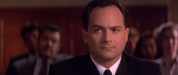 Movie still from “A Few Good Men” (1992), directed by Rob Reiner – A man in a suit and a tie; Close Up shot, Low angle