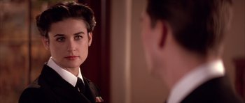 Movie still from “A Few Good Men” (1992), directed by Rob Reiner – A man and a woman are looking at one another; Close Up shot, Over the shoulder angle