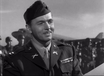 Movie still from “A Foreign Affair” (1948), directed by Billy Wilder – An old photo of a man in a military uniform; Close Up shot, Low angle