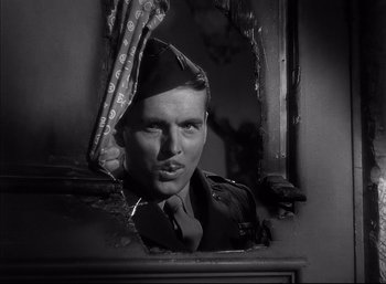 Movie still from “A Foreign Affair” (1948), directed by Billy Wilder – An old photo of a man looking into a mirror; Close Up shot, Low angle