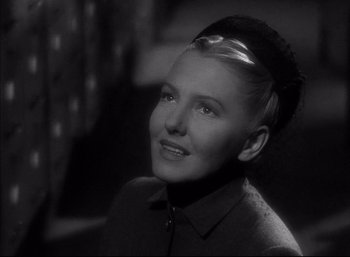 Movie still from “A Foreign Affair” (1948), directed by Billy Wilder – A black - and - white photo of a woman in a hat; Close Up shot, Low angle