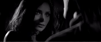 Movie still from “A Girl Walks Home Alone at Night” (2014), directed by Ana Lily Amirpour – A black - and - white photo of a woman's face; Close Up shot, Over the shoulder angle