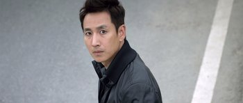 A person wearing a black jacket