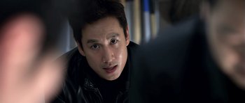 A person wearing a black jacket