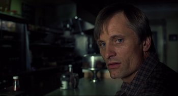 Movie still from “A History of Violence” (2005), directed by David Cronenberg – A person in a kitchen; Close Up shot, Over the shoulder angle