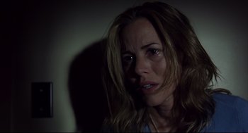 Movie still from “A History of Violence” (2005), directed by David Cronenberg – A person with long brown hair; Close Up shot, Low angle